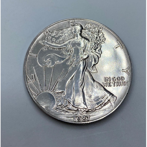 436 - Silver Liberty Walking Dollar 1987, 99.9% fine silver and uncirculated, good condition