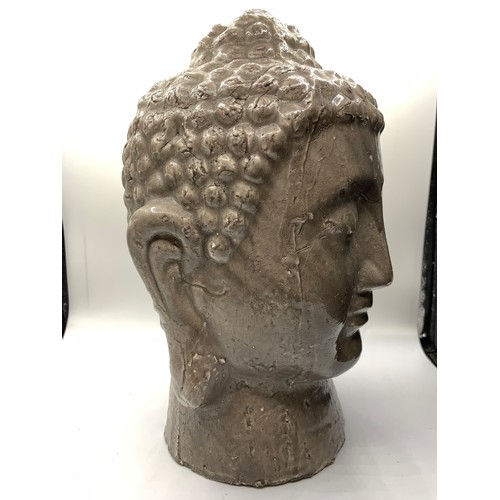 438 - A large earthenware Buddha Head with some damage, made for the PTMD Collection, Holland