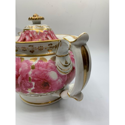 368 - A very early H&R Daniel Teapot with pink floral decoration in good condition