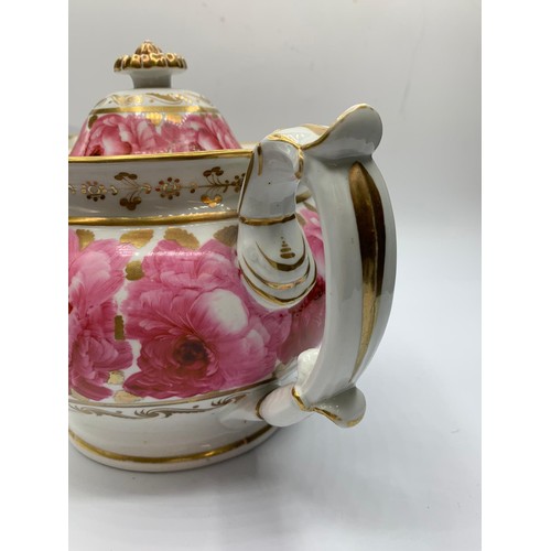 368 - A very early H&R Daniel Teapot with pink floral decoration in good condition