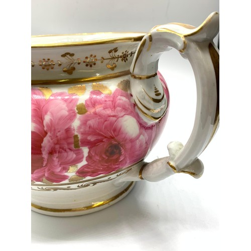 368 - A very early H&R Daniel Teapot with pink floral decoration in good condition