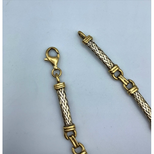 253 - (Withdraw) A 9ct yellow and white Gold linked woven Bracelet, weight 9g and 19cm approx