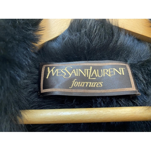 10 - An Yves Saint Laurent fur lined, knee length, leather coat, crafted from Black Metallic Leather (uni... 