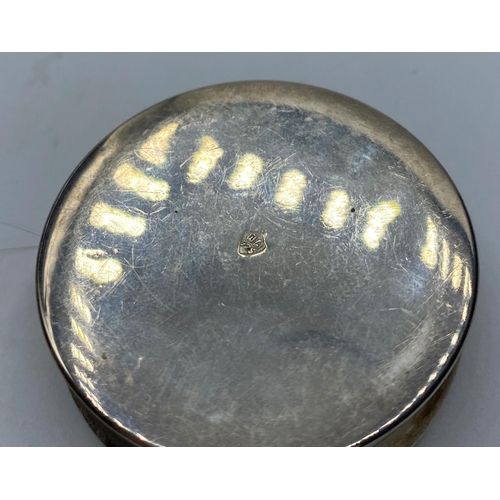 34 - A Greek silver and internally gilded box (pill box?) 48x48x18mm, with a mystic message in Greek lett... 