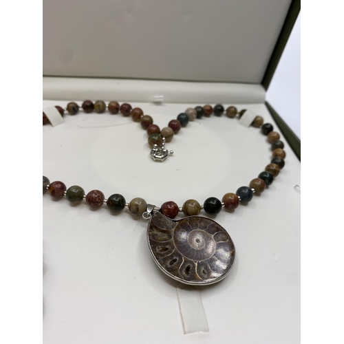 38 - A jasper and Jurassic Fossil Ammonites (163 million years old) necklace and matching earrings from M... 