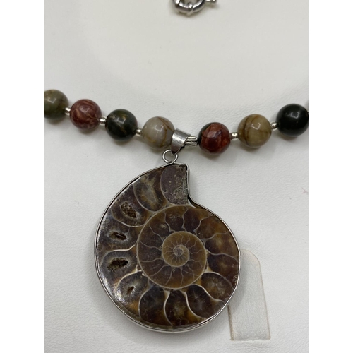 38 - A jasper and Jurassic Fossil Ammonites (163 million years old) necklace and matching earrings from M... 