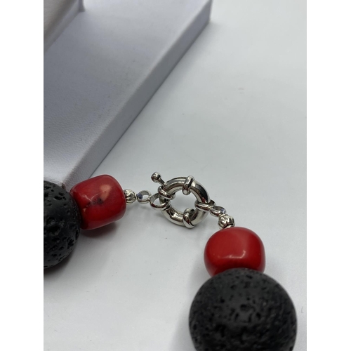 40 - An unusual Hawaiian lava and red coral necklace, bracelet and earrings set (beads 20mm).