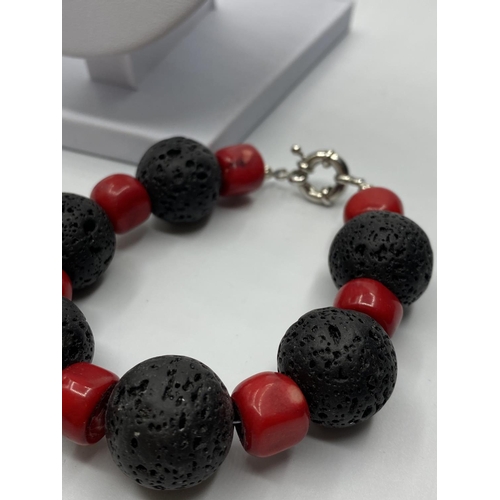 40 - An unusual Hawaiian lava and red coral necklace, bracelet and earrings set (beads 20mm).