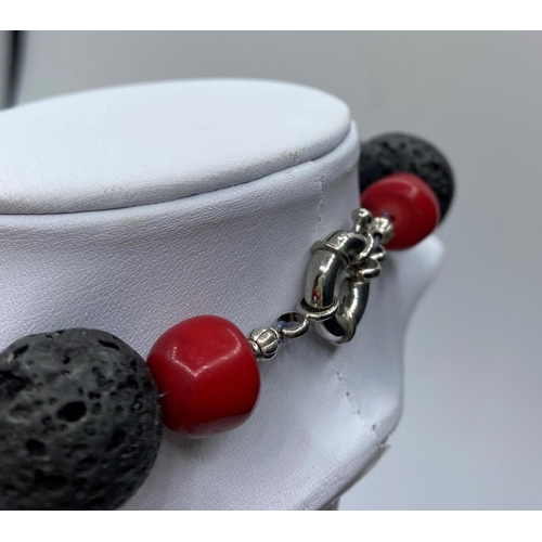 40 - An unusual Hawaiian lava and red coral necklace, bracelet and earrings set (beads 20mm).