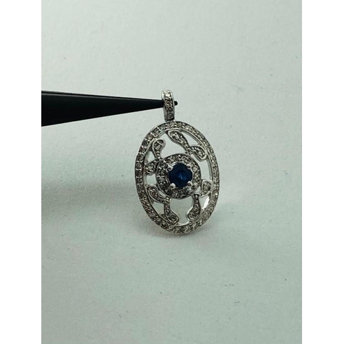 351 - 14K White Gold Pendant with 0.45ct Diamonds and Central Sapphire (3x3mm), weight 2.4g (ecn420)