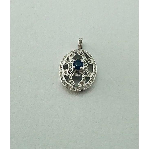 351 - 14K White Gold Pendant with 0.45ct Diamonds and Central Sapphire (3x3mm), weight 2.4g (ecn420)