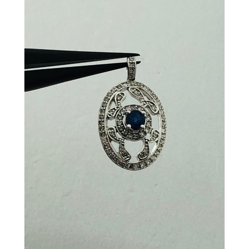 351 - 14K White Gold Pendant with 0.45ct Diamonds and Central Sapphire (3x3mm), weight 2.4g (ecn420)