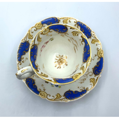 111 - H&R Daniel shell shape cup and saucer in good condition.