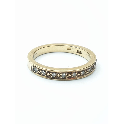 381 - 9CT Gold Half Eternity Ring having 9 Diamonds and gold beadwork to top, size N weight 3g approx