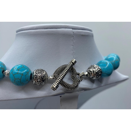 402 - A Turquoise/howlite Necklace, Bracelet and Earrings set(4)