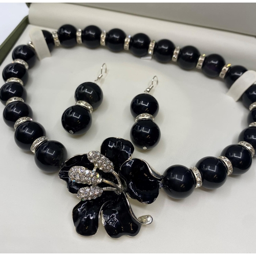 405 - A Mexican Obsidian Choker Necklace and matching Earrings set in a presentation box.