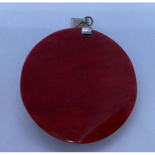 48 - Rare unusual Silver and Carnelian Pendant Having Cream Coloured Face to Front. 4cm in Diameter.