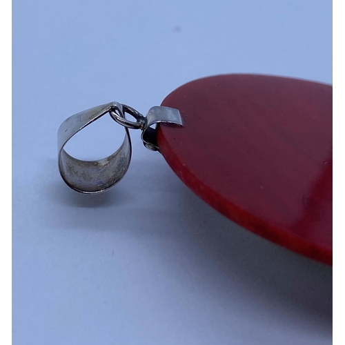 48 - Rare unusual Silver and Carnelian Pendant Having Cream Coloured Face to Front. 4cm in Diameter.