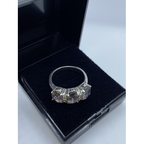 58 - Stone Set Silver Ring with Three Oval Mood Crystals that Change Colour in different lights.Marked 92... 