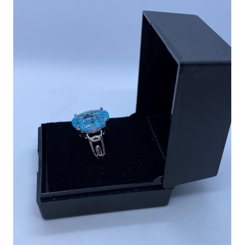 68 - Stone Set Silver Ring Having a Large Oval Sparkling Topaz Coloured Stone in Claw Mount. Design Pierc... 