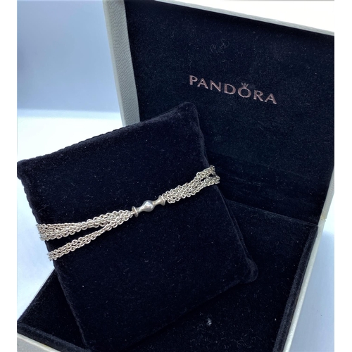 72 - Pandora Silver Chain Bracelet. Having 6 strands of Silver Links With the Pandora trademark Clasp Fas... 