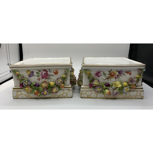 108 - A pair of Minton ornate ceramic stands with added floral garlands. One has a surface crack on top. 1... 