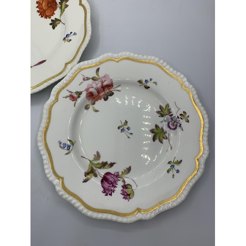 125 - A pair of H&R Daniel ribbed shape plates with floral design.