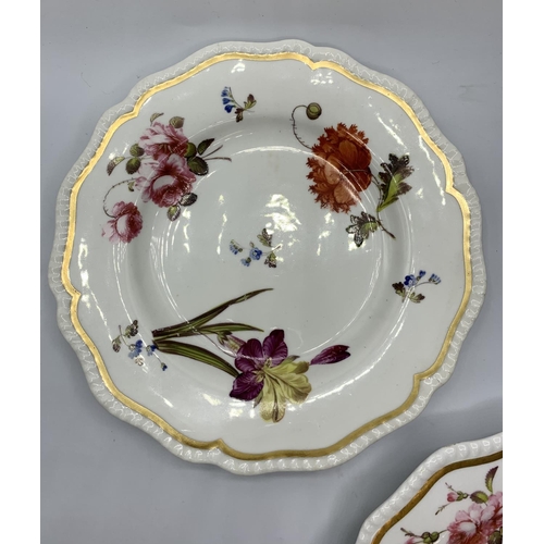 125 - A pair of H&R Daniel ribbed shape plates with floral design.