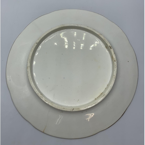 128 - H&R Daniel cusped shape plate with floral design, small hairline crack.