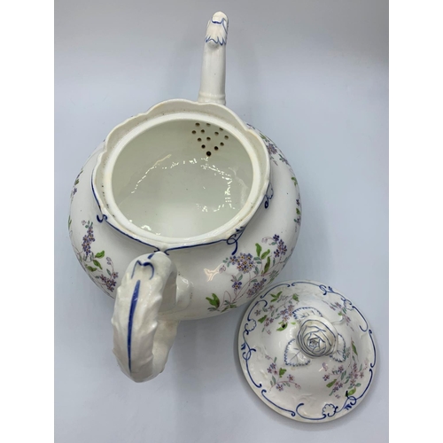 141 - H&R Daniel shell shape B tea pot in good condition, pattern no. 5704