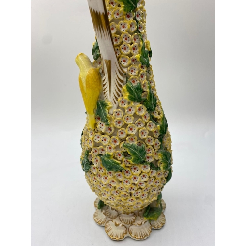 143 - H&R Daniel ornate scent bottle with applied flora and birds with original stopper, in good condition... 