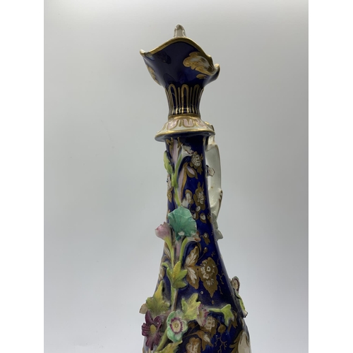 219 - H&R Daniel Scent Bottle with Applied Flowers. 27cms Tall in Good Condition.