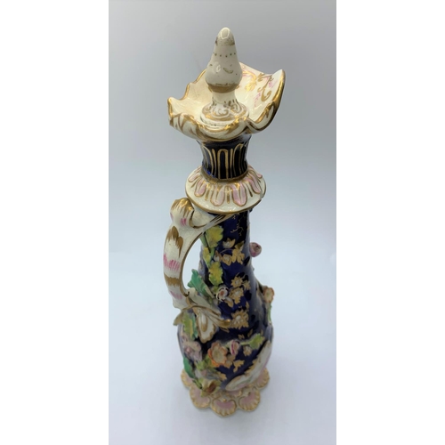 219 - H&R Daniel Scent Bottle with Applied Flowers. 27cms Tall in Good Condition.