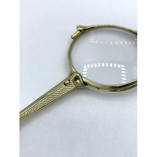 360 - Vintage Lorgnette folding Glasses set in 14ct Gold frame.