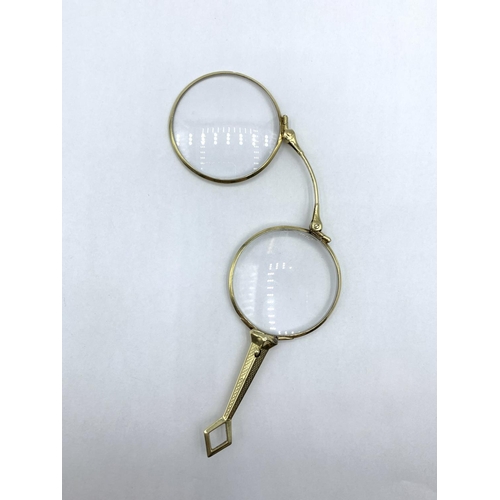 360 - Vintage Lorgnette folding Glasses set in 14ct Gold frame.