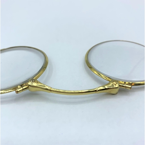 360 - Vintage Lorgnette folding Glasses set in 14ct Gold frame.