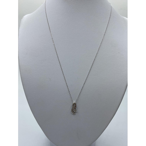 264 - 9ct Diamond Pendant & Chain, 1.2g, 44cms.