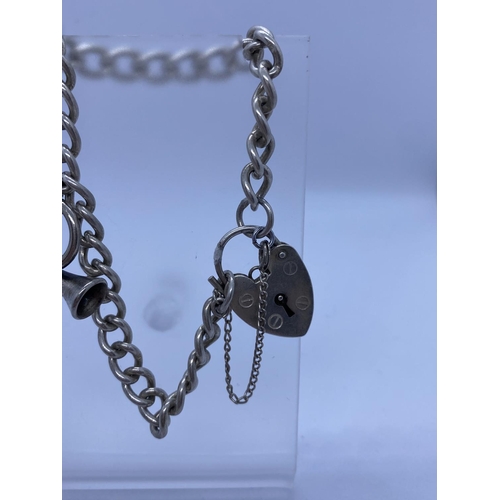 282 - Silver Bracelet with Bugle Charm & Heart Padlock, 17.6g, 18cms.