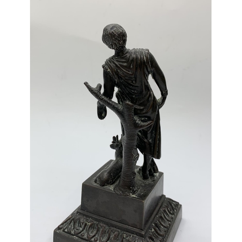 175 - Small bronze statue of a man and deer, 14cms tall and weighs 564g.