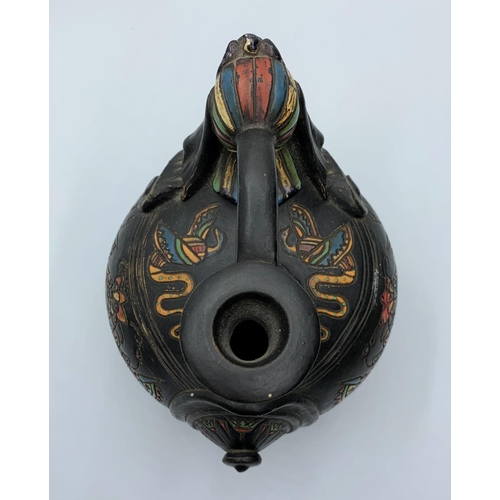 177 - Decorated Egyptian style wine jug, 13cms tall.