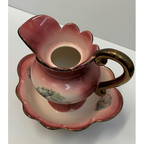 191 - A Staffordshire water jug and matching washing bowl, nicely decorated pink/coral colour.