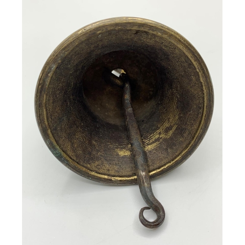 259 - Vintage bronze bell, 9cms tall.