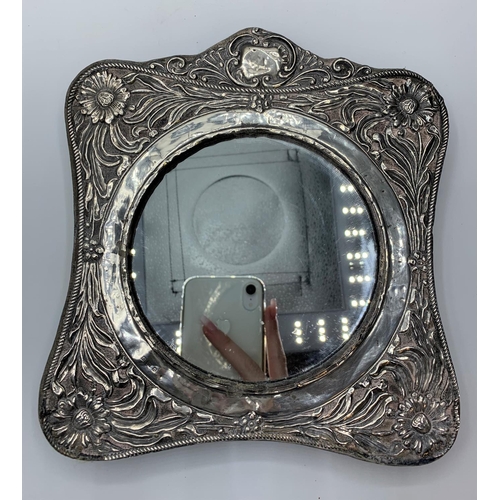 273 - Victorian ornate silver framed mirror 18x20cms, weighs 260g