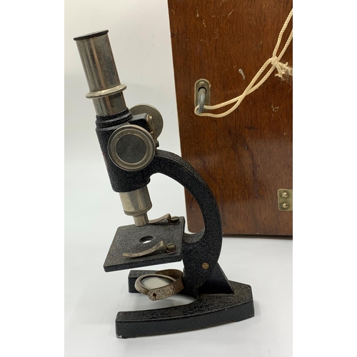 310 - Vintage microscope in wooden box with lock & key, 26x10cms