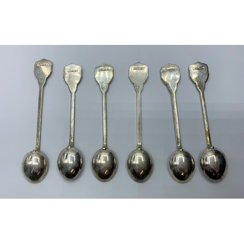 371 - 6 silver honey spoons with Indian cities and emblems on handles.