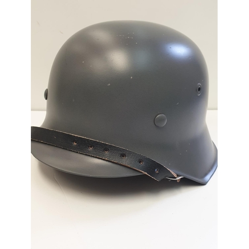 11 - WW2 Style German M42 Re-enactors steel helmet.  Marked et.64 (replica)