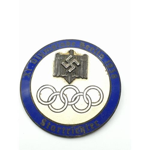 45 - (Withdraw) 1936 Berlin Olympics Medallion and Enamel Badge.