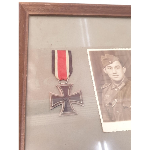 6 - WW2 Framed German Iron Cross 2nd Class & Black Wound Badge with photograph of the recipient. The med... 