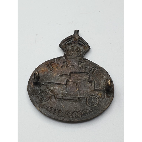 85 - WW1 Cap Badge Royal Navy Air Service.(Armoured Car Section) Kings Crown Blackened Brass.