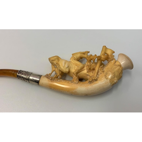 304 - A hand carved late 19th century Bone Pipe with a horse racing theme in custom leather case, 16cm len... 